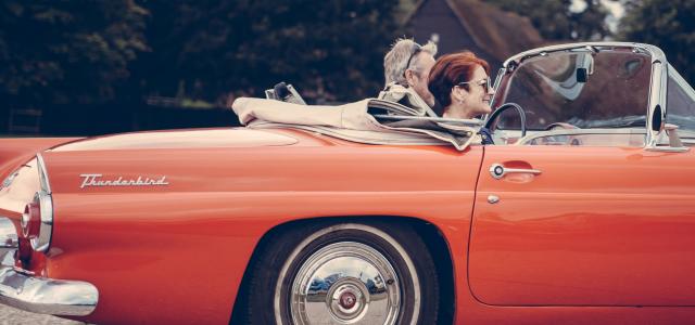 two person riding vintage coupe by Clem Onojeghuo courtesy of Unsplash.